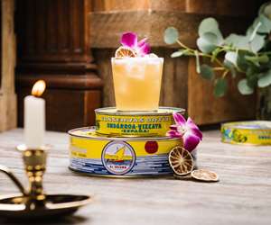 Cocktail atop tinned fish